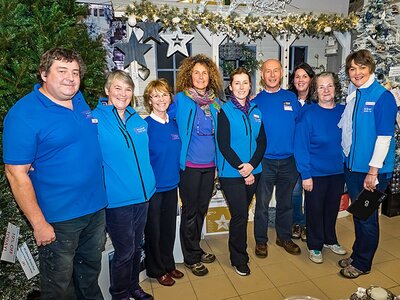 2015 - Ronan with staff in the Christmas Shop