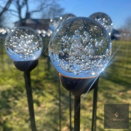Bubble filled glass ball stake. -Image courtesy of LV Bespoke