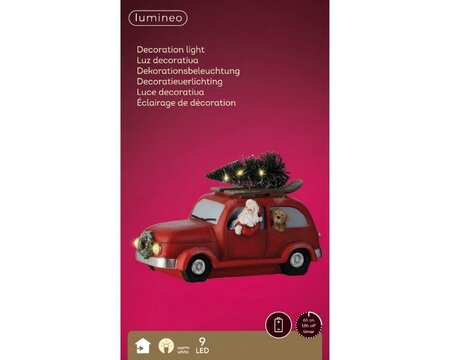 Santa in lit red car - image 2