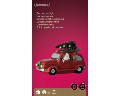 Santa in lit red car - image 2