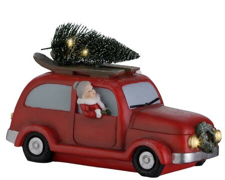 Santa in lit red car - image 3
