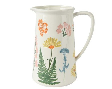 White jug with flowers